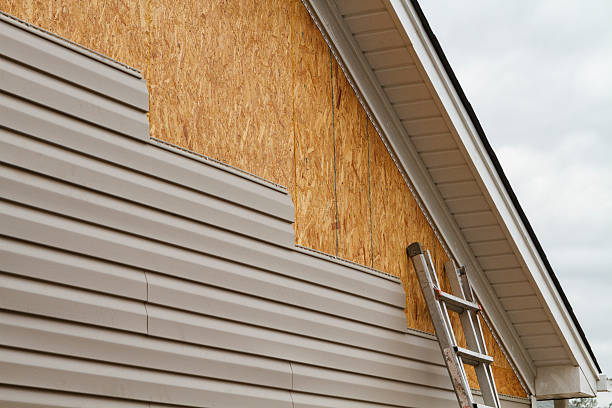 Professional Storm Damage Siding Repair technician working in Strongsville, OH